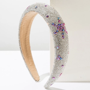 Sparkling sponge padded headband with white rhinestones and colorful star accents