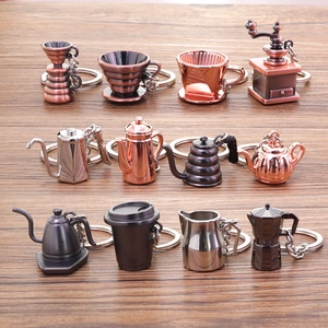Zinc alloy 3D coffee keychain set featuring mini moka pots and grinders on wood