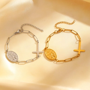 Vintage gold and silver paperclip chain bracelets with oval Maria cross pendants