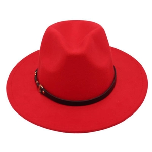 Close-up of red wool fedora hat with black leather belt and gold metal buckle detail
