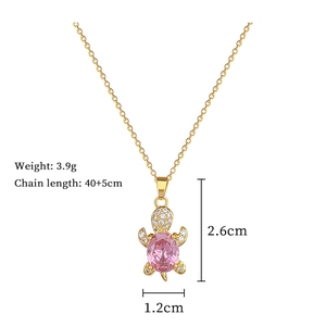 Detailed view of pink turtle pendant with dimensions 2.6cm x 1.2cm and 3.9g weight