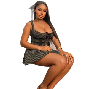 Chic striped bodycon mini dress set with lace-up detail on a white background