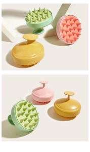 Detail of ergonomic handle and soft silicone bristles on the scalp massage brush