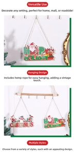 Detail of multi-layered Christmas wooden signs with Happy Holiday text and Santa motifs