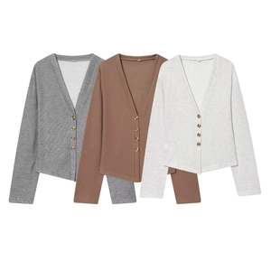 Three-piece V-neck ribbed knit cardigan set in grey, brown and beige tones with metal buttons