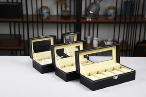 Detailed view of 2, 3, and 5 slot black PU leather watch boxes with clear glass windows