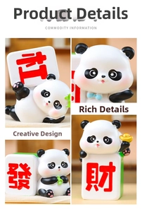 Close-up of creative panda resin figurines with mahjong tiles and golden sycee details