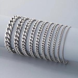 Silver stainless steel Cuban link chains in various widths for men and women