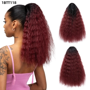 Detail view of ombre black to red long wavy ponytail with drawstring mesh net base