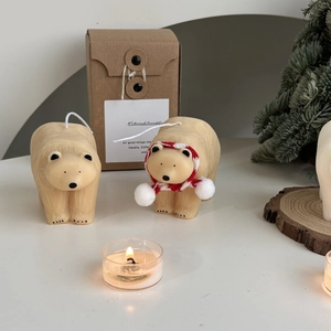 Polar bear scented candles with red scarf in a kraft gift box for winter home decor