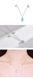 Detail of S925 silver Aquarius necklace with water-drop blue stone and zodiac charms