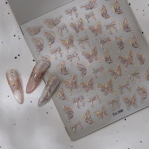 3D laser butterfly and bow nail stickers in purple with gold aurora metallic edges