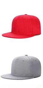 Detailed view of red and gray flat brim hip hop hats with embroidered eyelets