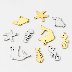 DIY stainless steel ocean charms including dolphins and starfish in gold and silver