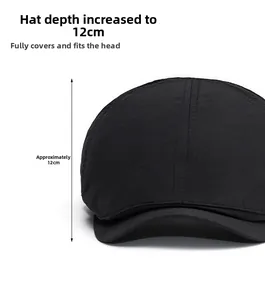 Detail of thin quick-dry black beret showing 12cm deep crown for full-wrap head fit