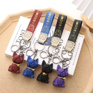 French Bulldog keychains in geometric style with leather straps and colorful finish