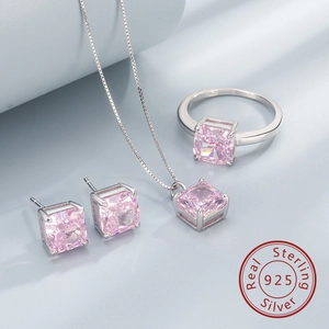 Detail of 925 sterling silver jewelry set featuring pink square-cut zircon stones