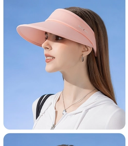 Detailed side view of pink wide brim open top sun hat with BAODIDUO logo on women