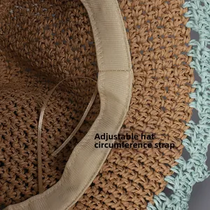 Close-up of the internal adjustable drawstring and sweatband of the woven straw hat