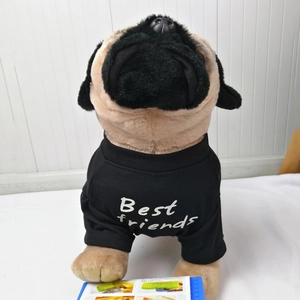 Detail of black cotton pet T-shirt featuring white Best friends printed text design