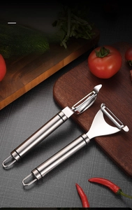 Close-up of 304 stainless steel I-shape and Y-shape vegetable peelers on wooden board