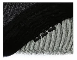 Detailed close-up of wide padded sweatband and stitching inside the casual sun hat