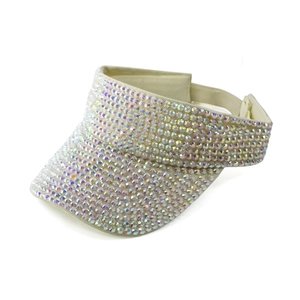 Close-up of sparkling rainbow rhinestones on a beige open top visor sun hat
