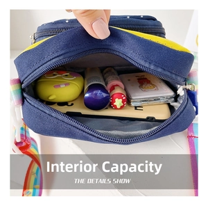 Detail showing internal capacity of the navy and yellow unicorn bag with rainbow strap