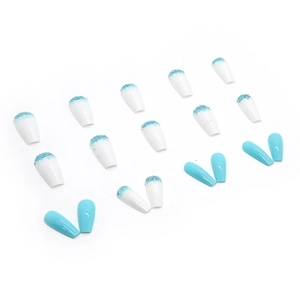 Medium-long ballerina press-on nails with blue glitter gradient and solid sea salt finish