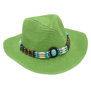 Detail of green straw sun hat featuring a bohemian turquoise bead ethnic band decoration