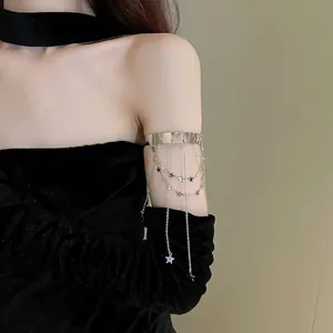 Silver star heart tassel arm cuff with layered chains and metal star charms