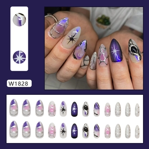 Starry almond press-on nails with 3D silver embossed star motifs and cat eye glitter