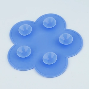 Detail of blue flower silicone makeup brush cleaning mat with 5 suction cups