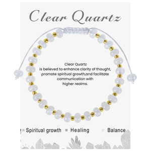 Macro view of clear quartz bead bracelet with golden spacers and adjustable cord