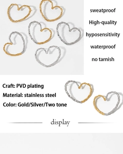 Detailed view of hammered heart earrings in stainless steel with PVD gold plating