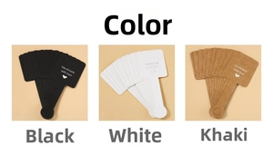 Detailed view of handmade labels in black, white, and kraft for jewelry packaging