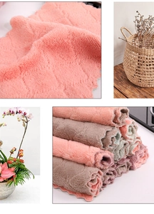 Detailed texture of thick coral fleece cleaning cloths in multiple colors for kitchen