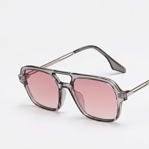 Retro double bridge square sunglasses with transparent grey frame and pink lenses