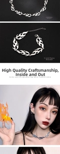 Detailed view of silver flame style metal jewelry set with necklace and bracelet