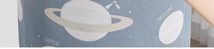 Detail of space-themed storage basket featuring Jupiter and Neptune planet prints