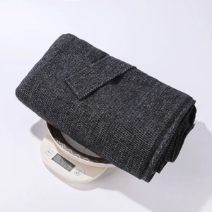 Detail showing the 445.7g weight measurement of the dark gray cashmere-like poncho wrap
