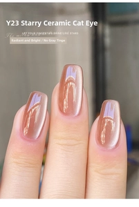 Close-up of champagne pink ceramic cat eye nail polish Y23 with shimmering finish