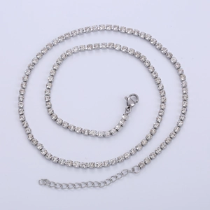 Detail of silver tennis chain with round white zircons and adjustable lobster clasp