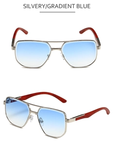 Detail of pilot sunglasses with silver metal frames and wood grain temple arms