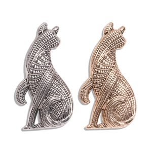 Vintage cat brooches in silver and rose gold finishes with intricate metallic textures