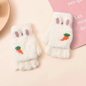 Detail of white plush fingerless gloves with rabbit ears and carrot embroidery design