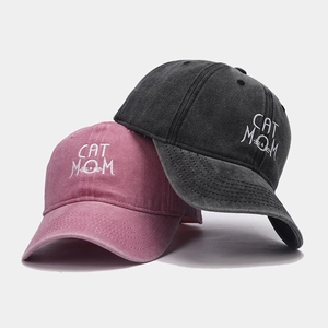 Distressed cotton baseball caps with CAT MOM embroidery in washed charcoal and vintage pink
