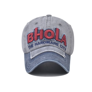 Detailed embroidery of BHOLA logo on vintage distressed blue and grey baseball cap