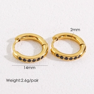 Detailed view of 14mm gold huggie earrings with black crystals and 2mm thickness specs