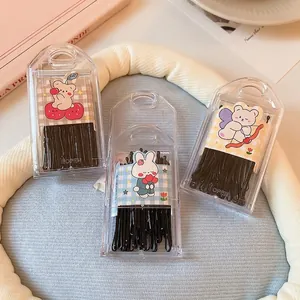 Three-pack of basic black metal bobby pins in portable cases with cute cartoon stickers